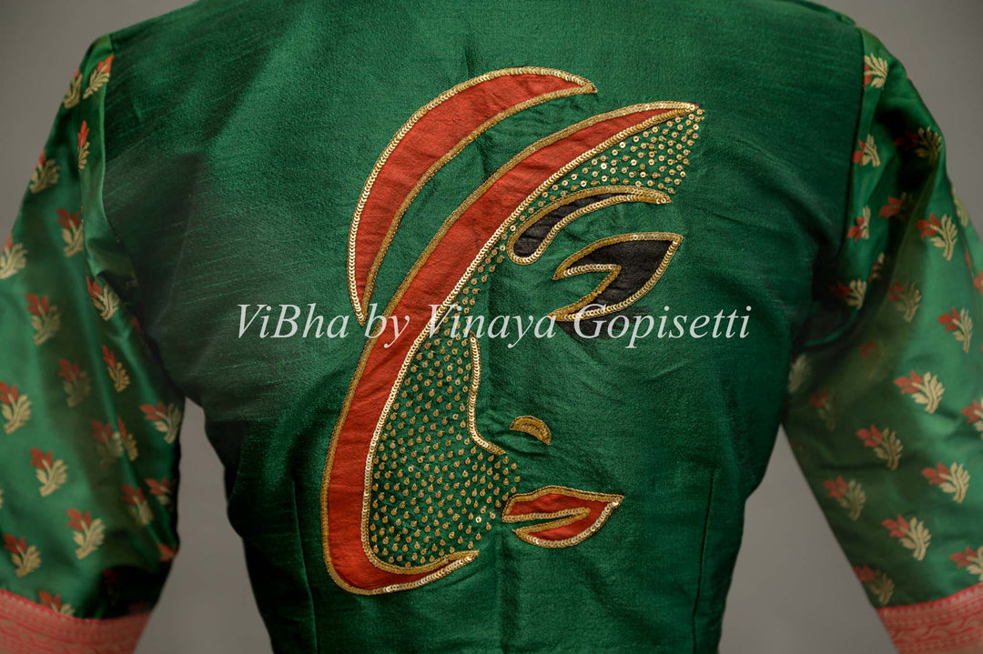 Green hand painted blouse with embroidery and benares brocade sleeves