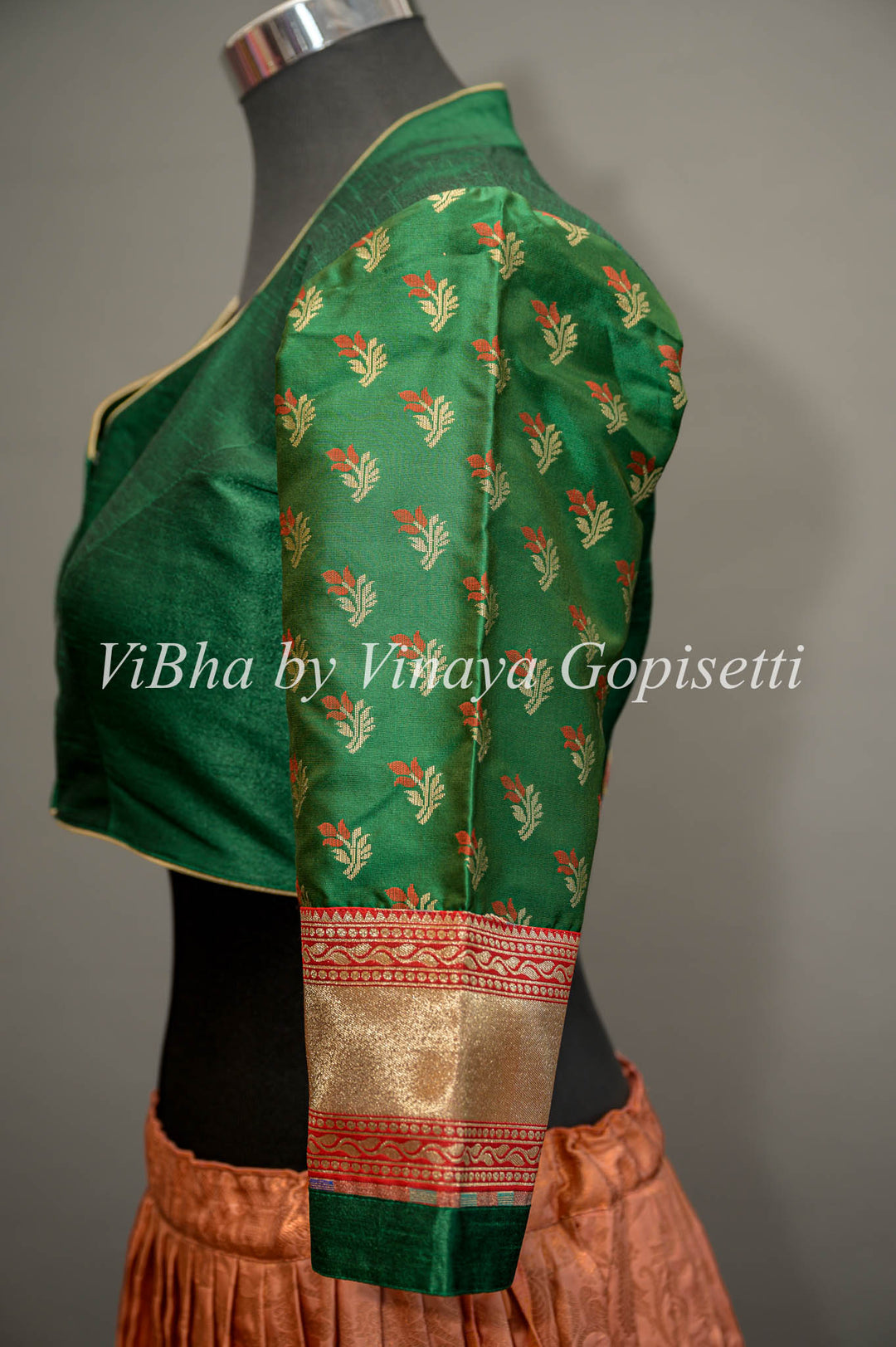 Green hand painted blouse with embroidery and benares brocade sleeves