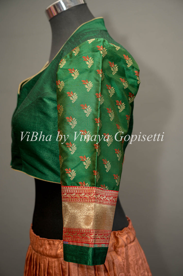 Green hand painted blouse with embroidery and benares brocade sleeves