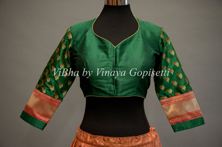 Green hand painted blouse with embroidery and benares brocade sleeves