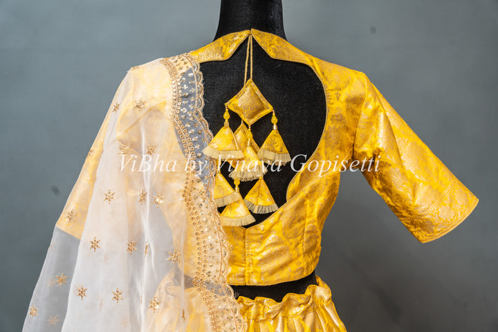 Yellow and White Banarasi Silk Lehenga With White Dupatta
