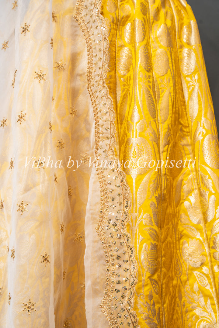 Yellow and White Banarasi Silk Lehenga With White Dupatta