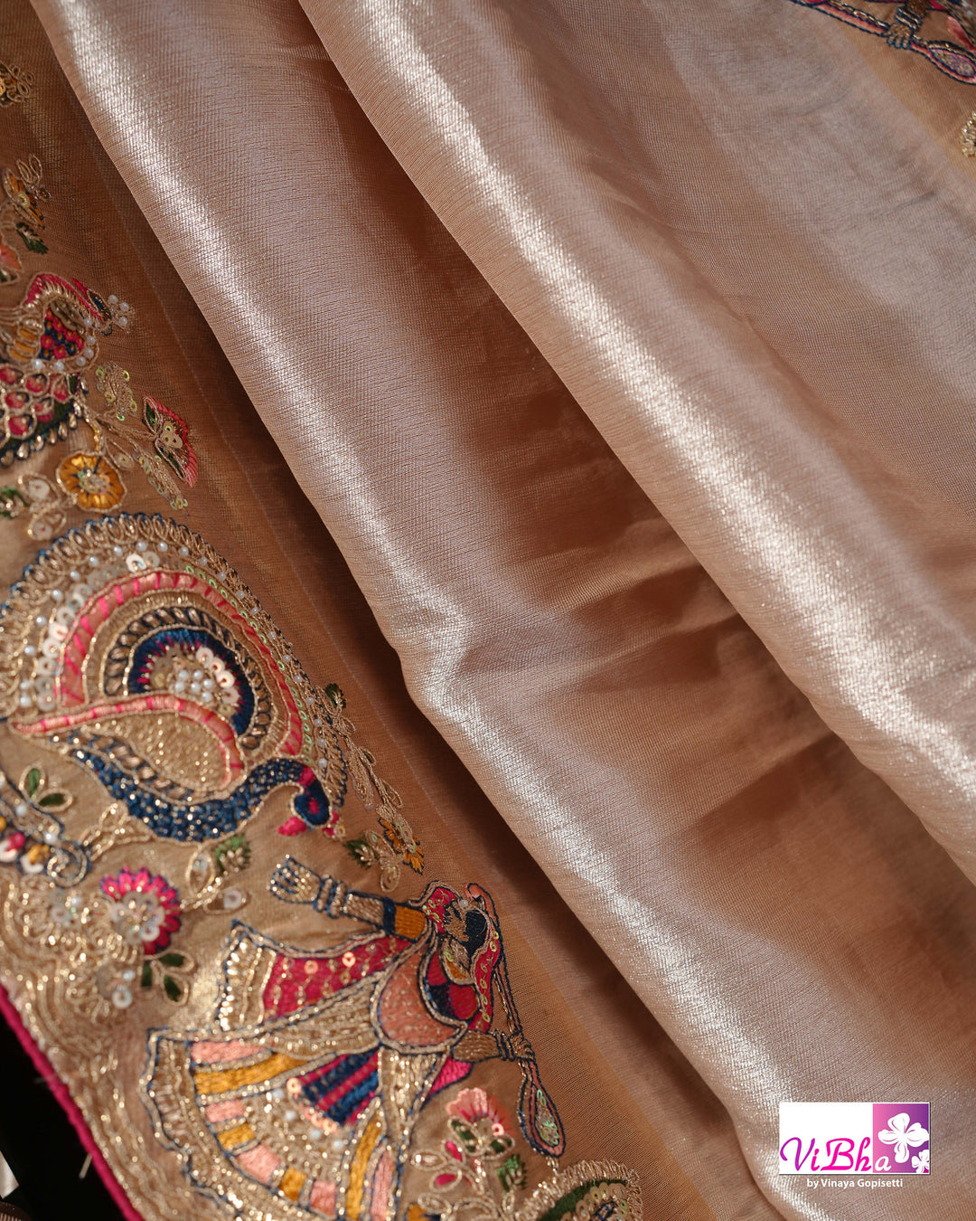 Champagne Designer Saree with Multicolour Peacock and Figurative Border