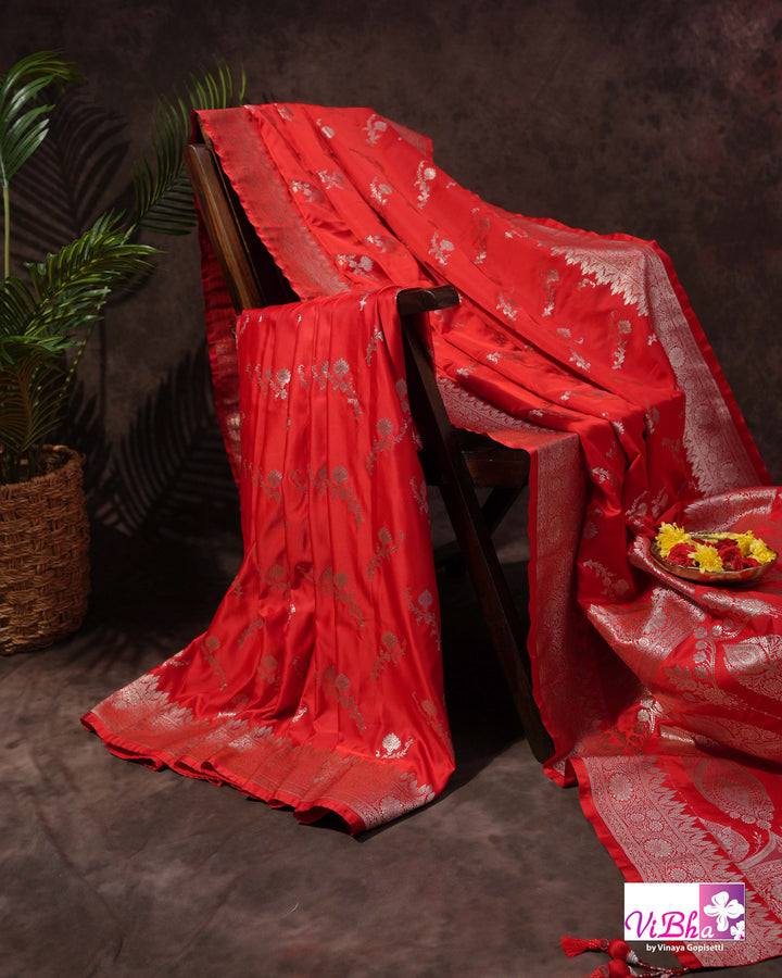 Red all over silver zari saree