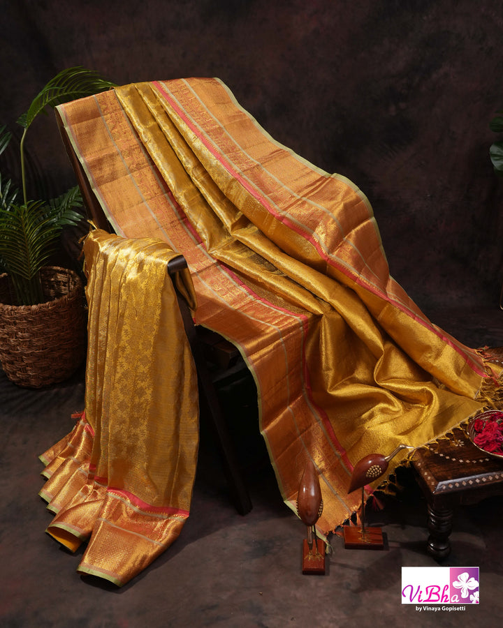 Antique Gold Kanchi Silk Saree with Copper Orange Border and Green Accents