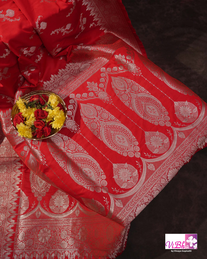 Red all over silver zari saree