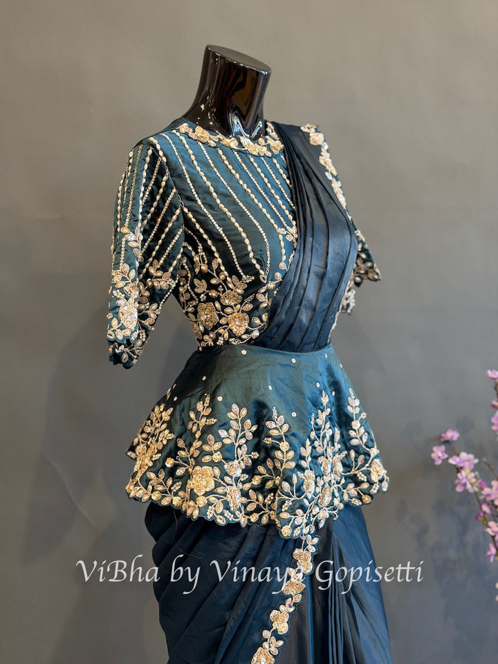 Peacock blue pre draped saree with a peplum blouse