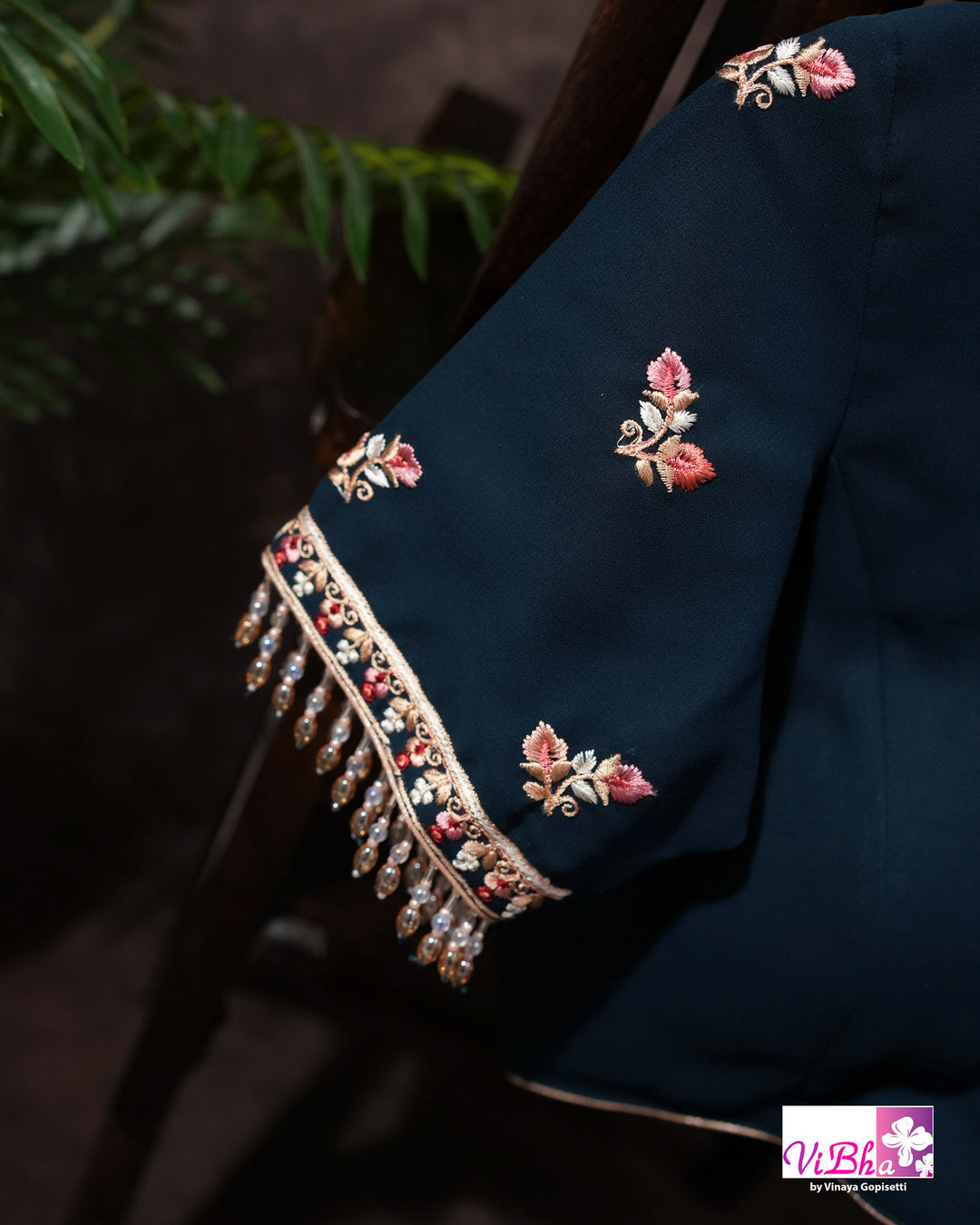 Midnight Blue Designer Saree with Pink and Gold-Toned Floral Embroidery