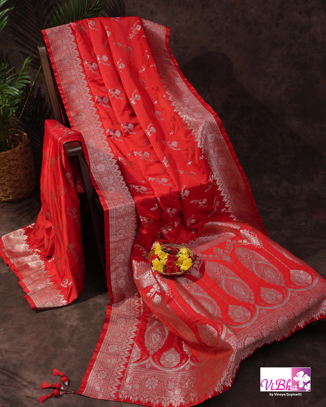 Red all over silver zari saree