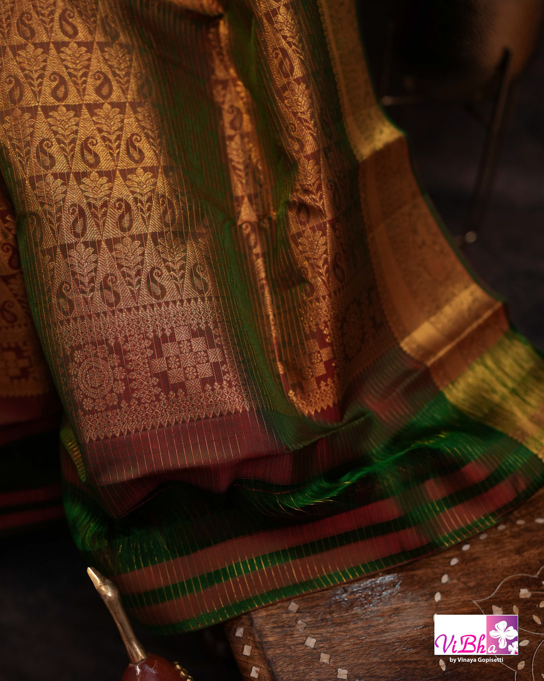 Vermilion Orange Kanchi Silk Saree with Gold Zari Weaving and Green Embroidered Blouse