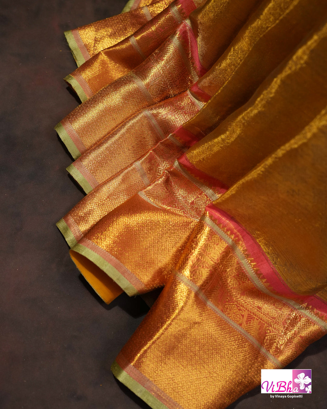 Antique Gold Kanchi Silk Saree with Copper Orange Border and Green Accents