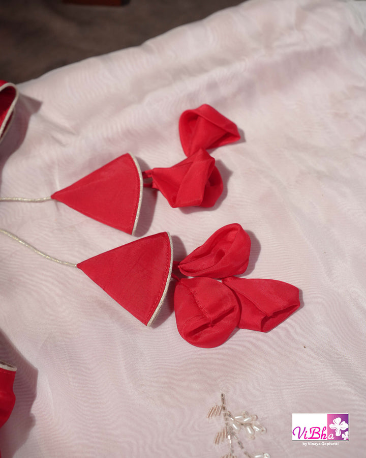 White and Red Designer Saree with Scalloped Floral Embellished Border