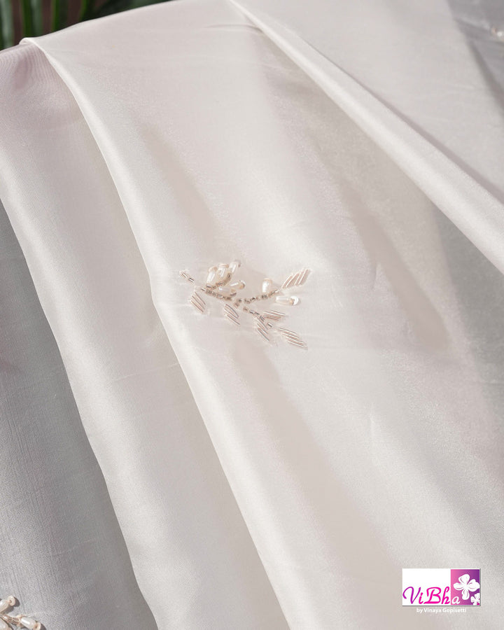 White and Red Designer Saree with Scalloped Floral Embellished Border