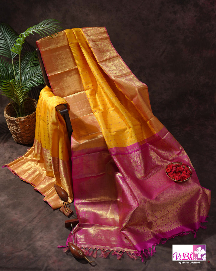 Marigold Yellow Kanchi Silk Saree with Broad Gold Border and Magenta Pallu