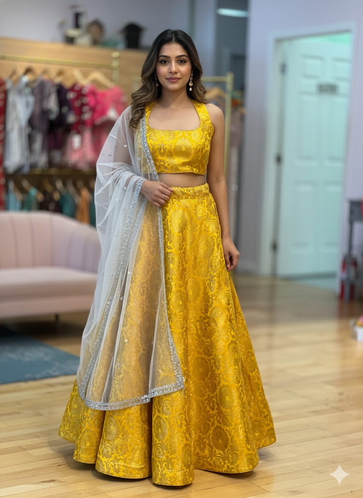 Yellow Banarasi-Silk Brocade Lehenga And Blouse With White Dupatta
