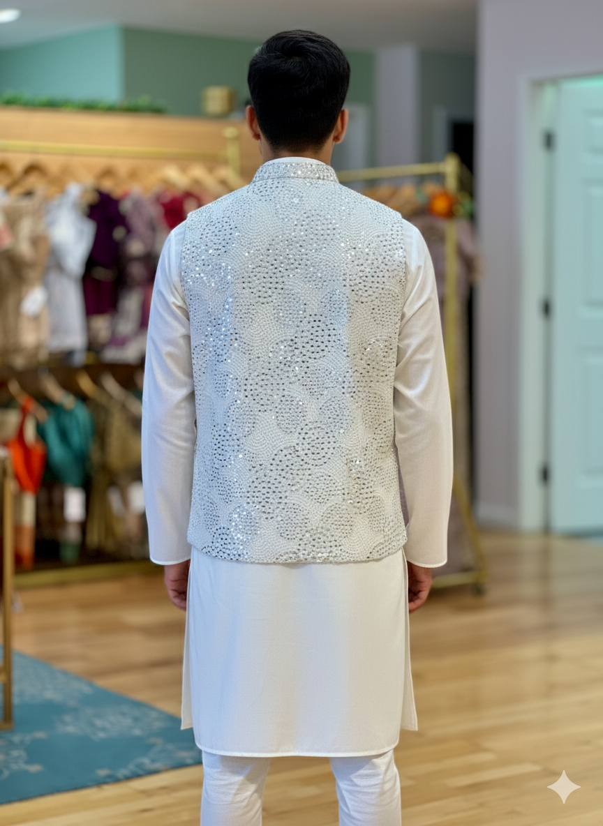 Pristine White Assymmetrical Kurta And Pajama WIth Embroidered Vest