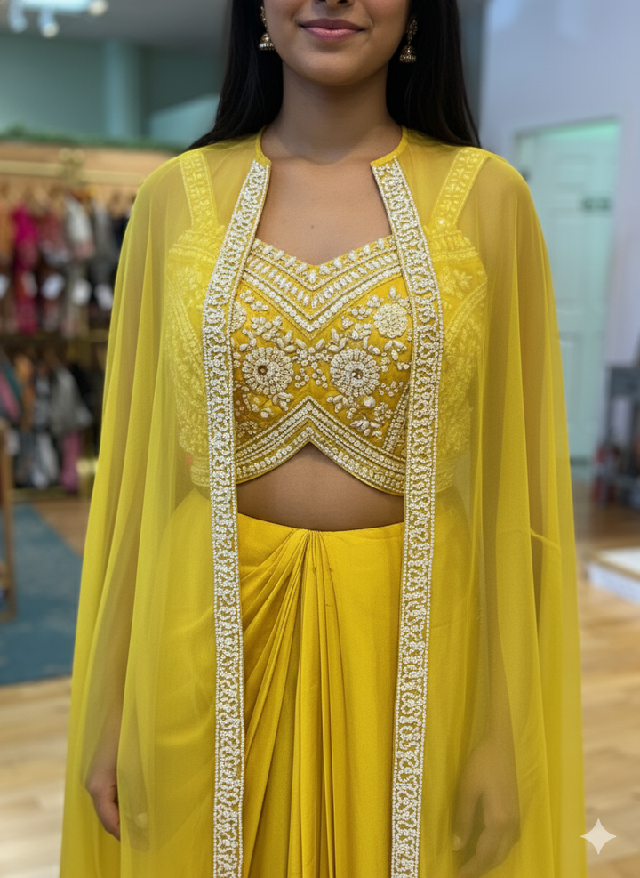 Yellow Draped Skirt With Embroidered Blouse And Cape