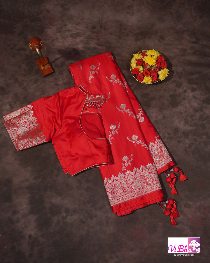 Red all over silver zari saree