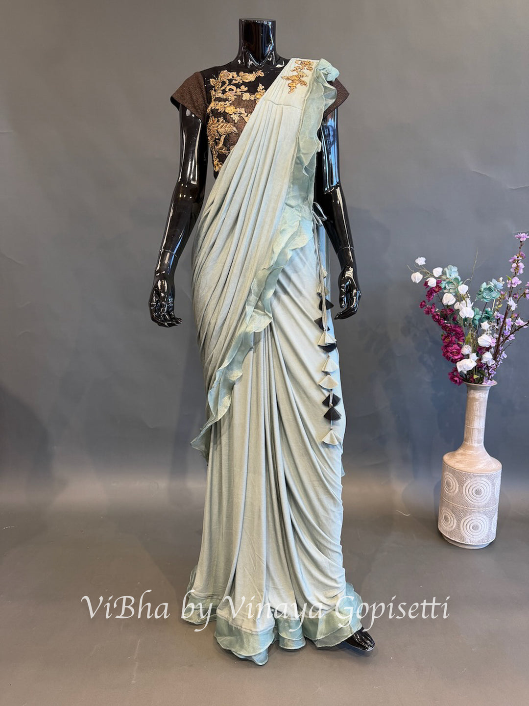 Dusty Ice blue and brown pre draped saree and blouse