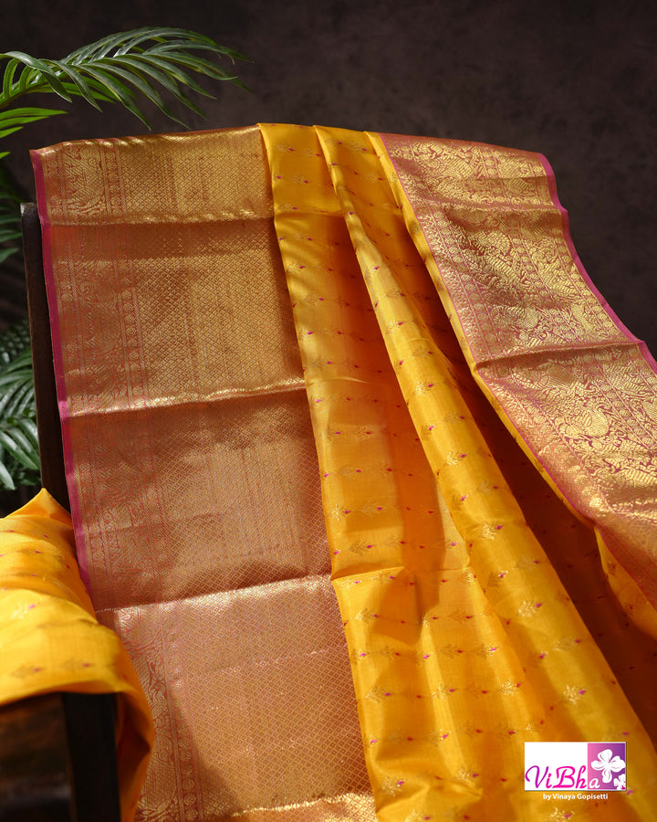 Marigold Yellow Kanchi Silk Saree with Broad Gold Border and Magenta Pallu