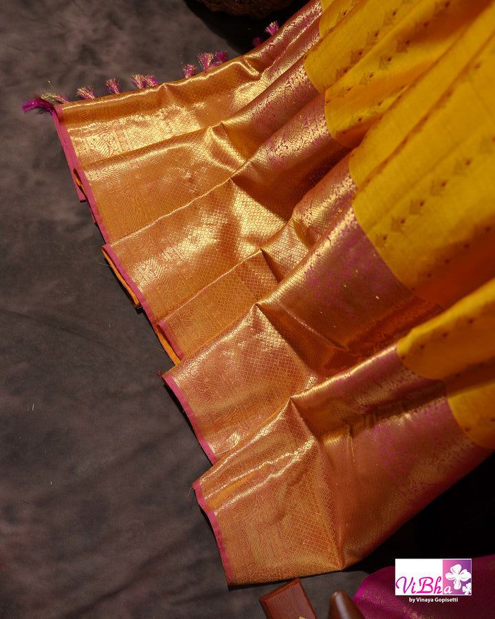 Marigold Yellow Kanchi Silk Saree with Broad Gold Border and Magenta Pallu
