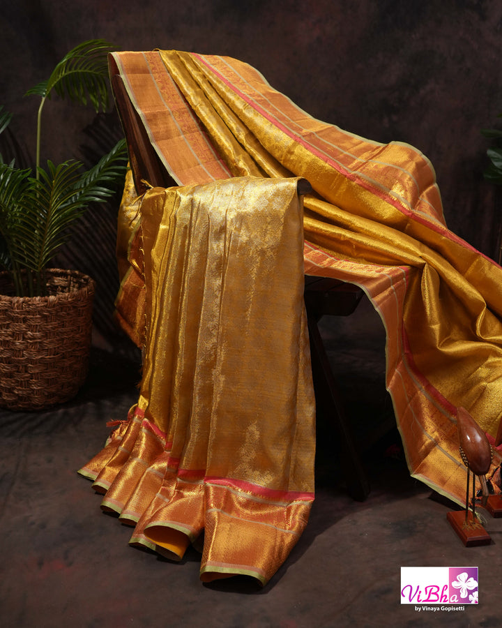 Antique Gold Kanchi Silk Saree with Copper Orange Border and Green Accents
