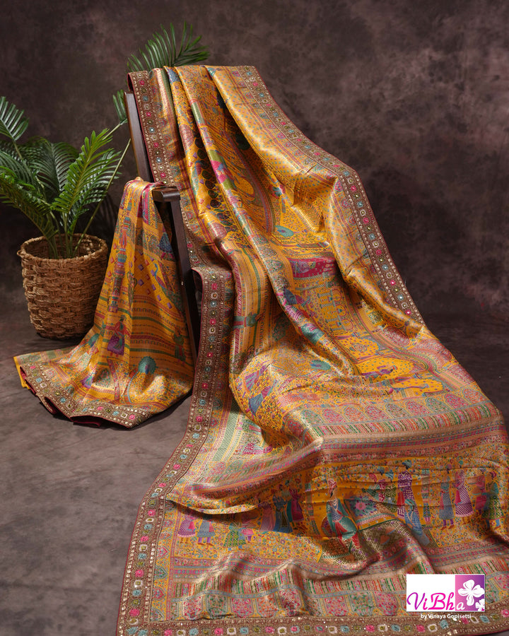 Mustard Yellow Designer Saree with Multicolour Figurative Motifs and Ornate Border