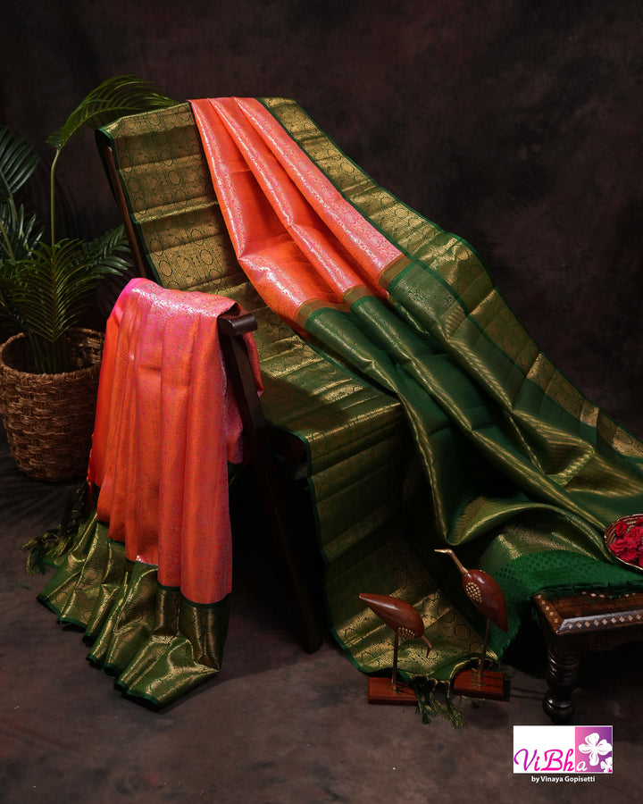 Coral Pink Kanchi Silk Saree with Floral Woven Design and Forest Green Gold Border