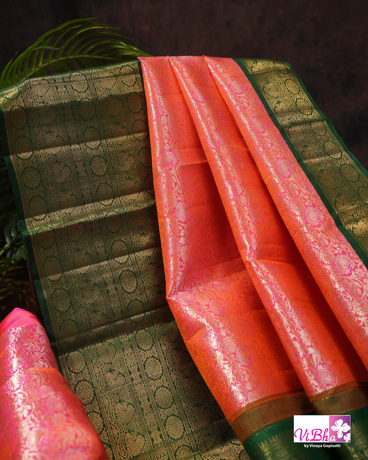 Coral Pink Kanchi Silk Saree with Floral Woven Design and Forest Green Gold Border