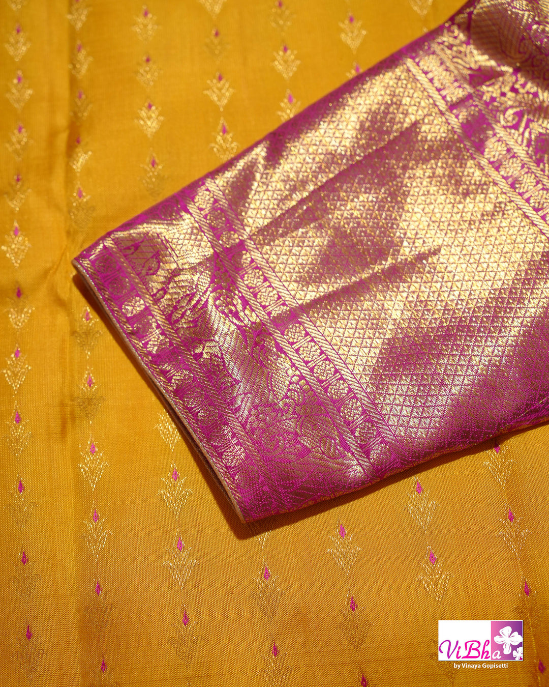 Marigold Yellow Kanchi Silk Saree with Broad Gold Border and Magenta Pallu
