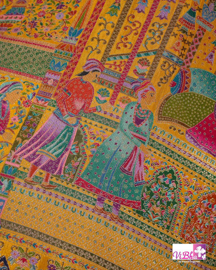 Mustard Yellow Designer Saree with Multicolour Figurative Motifs and Ornate Border