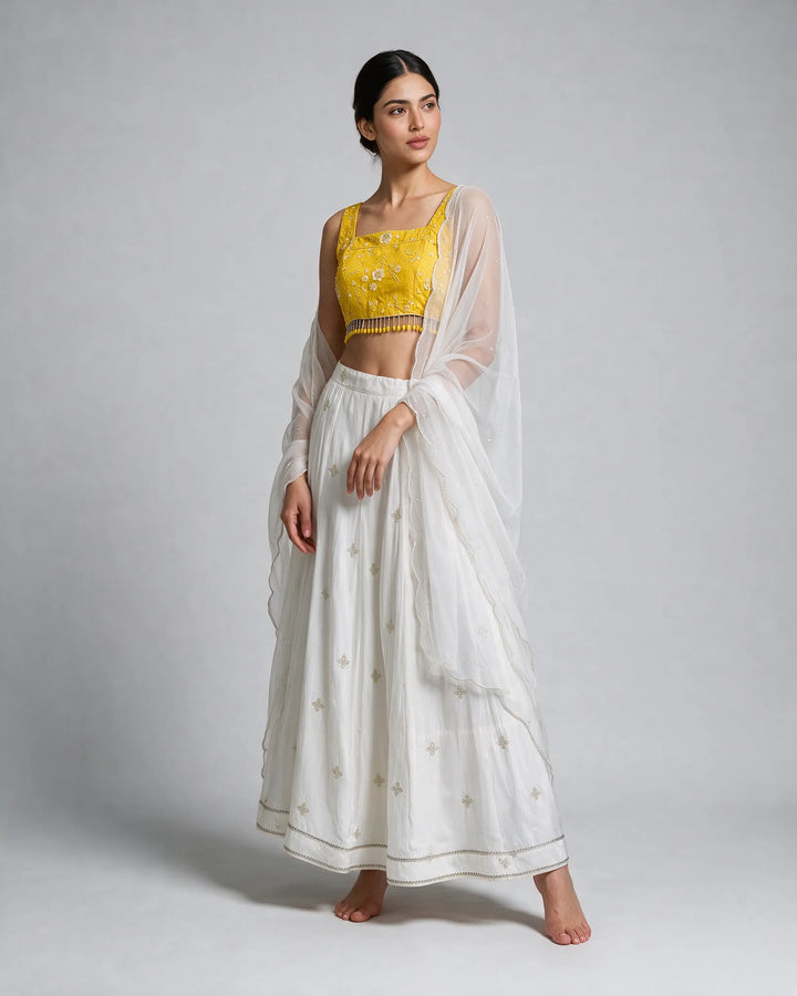 White Lehenga with Gold Blouse