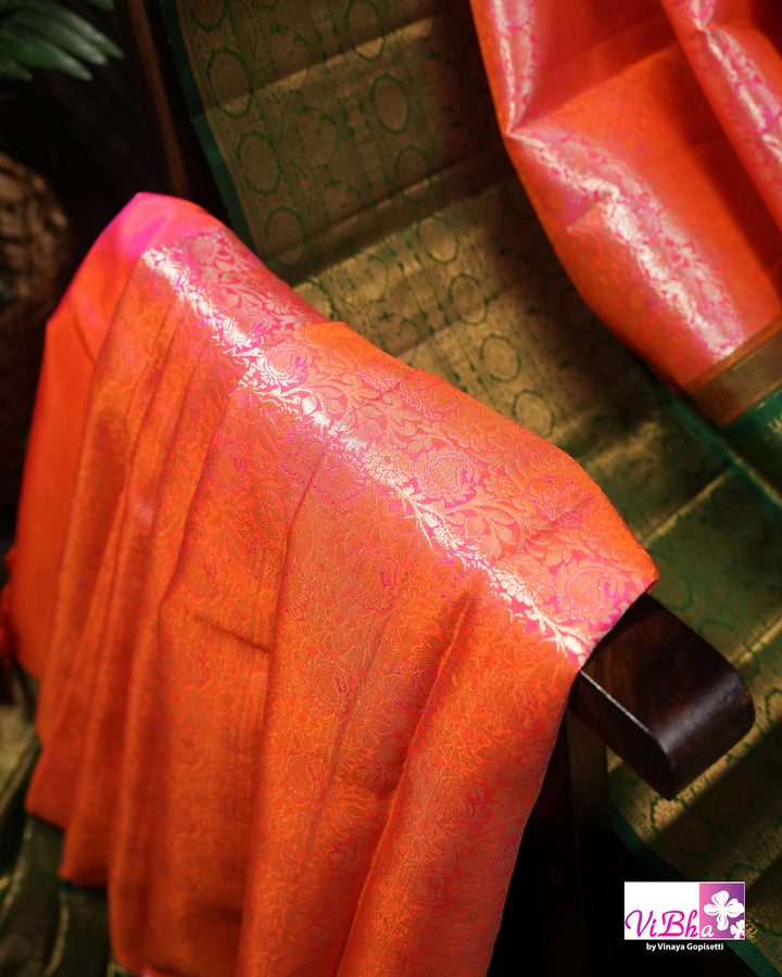Coral Pink Kanchi Silk Saree with Floral Woven Design and Forest Green Gold Border
