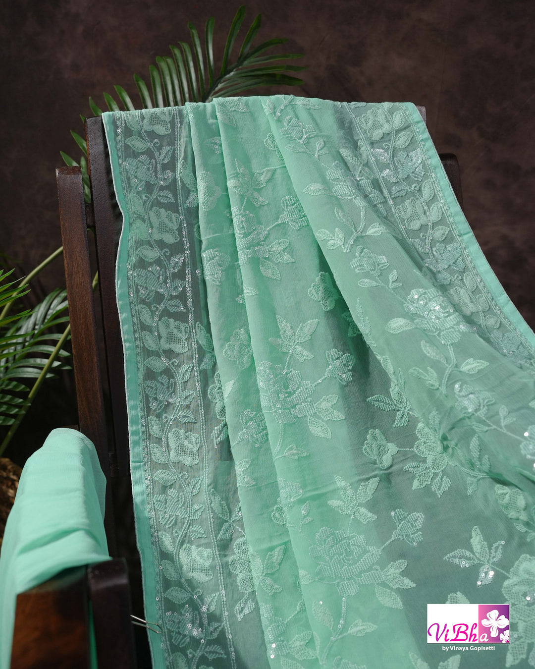 Mint Green Designer Saree with Tonal Floral Embroidery and Tassel Details