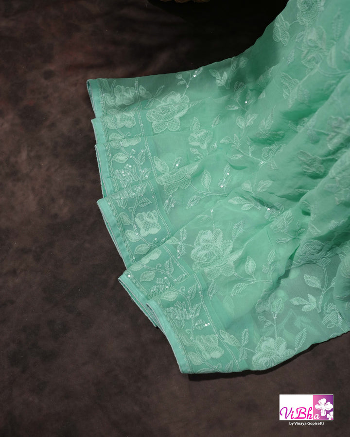 Mint Green Designer Saree with Tonal Floral Embroidery and Tassel Details