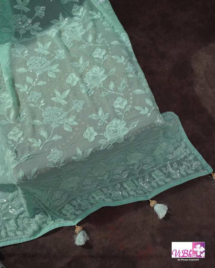 Mint Green Designer Saree with Tonal Floral Embroidery and Tassel Details