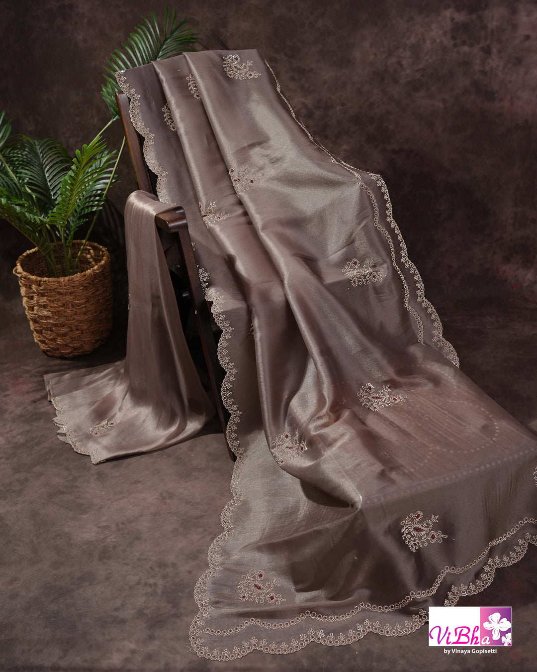 Taupe Shimmer Designer Saree with Ornamental Motifs and Scalloped Border