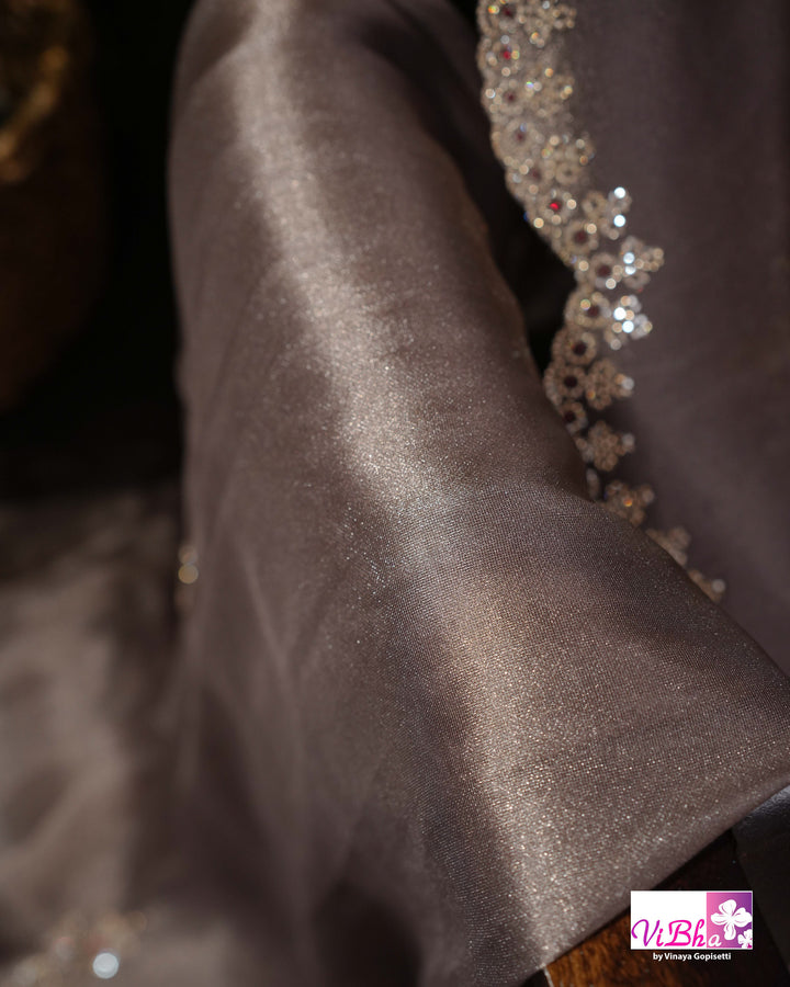 Taupe Shimmer Designer Saree with Ornamental Motifs and Scalloped Border