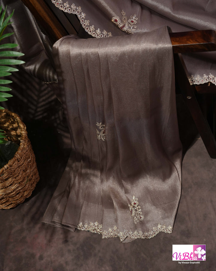 Taupe Shimmer Designer Saree with Ornamental Motifs and Scalloped Border