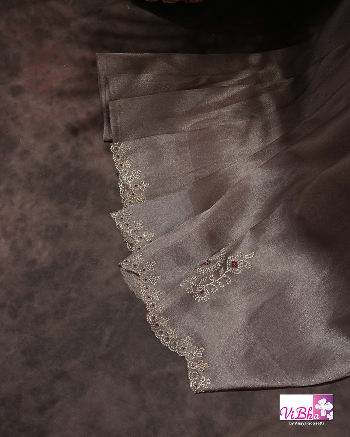 Taupe Shimmer Designer Saree with Ornamental Motifs and Scalloped Border