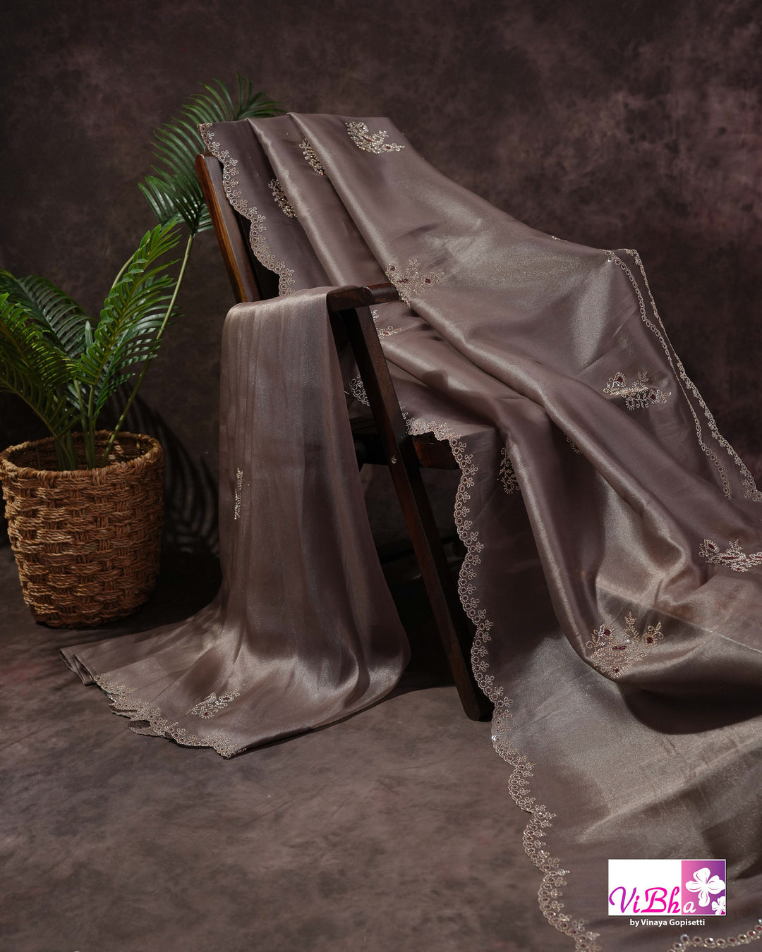 Taupe Shimmer Designer Saree with Ornamental Motifs and Scalloped Border