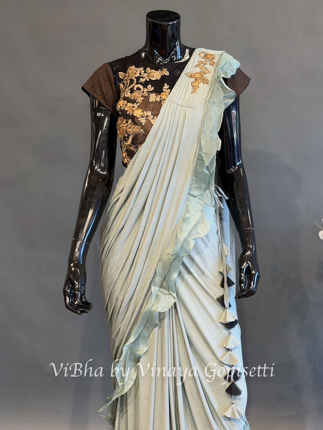 Dusty Ice blue and brown pre draped saree and blouse