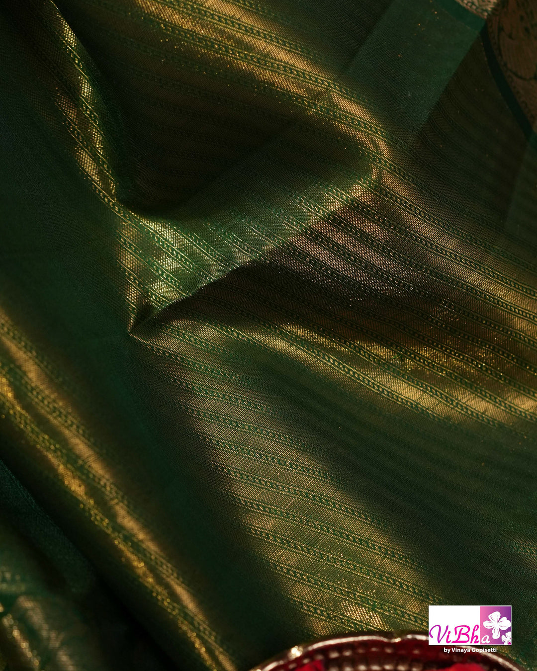 Coral Pink Kanchi Silk Saree with Floral Woven Design and Forest Green Gold Border