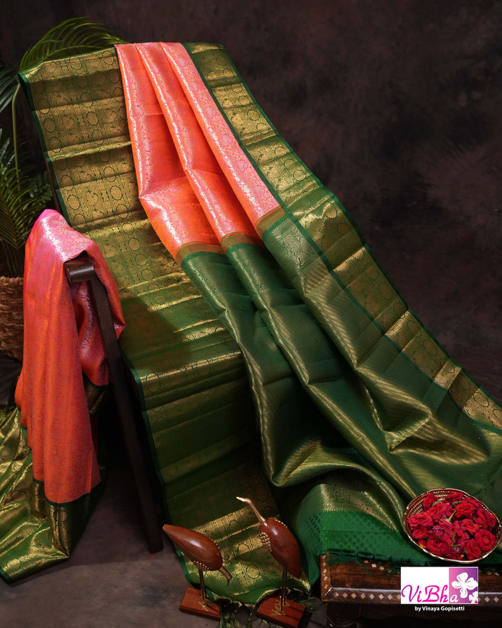 Coral Pink Kanchi Silk Saree with Floral Woven Design and Forest Green Gold Border