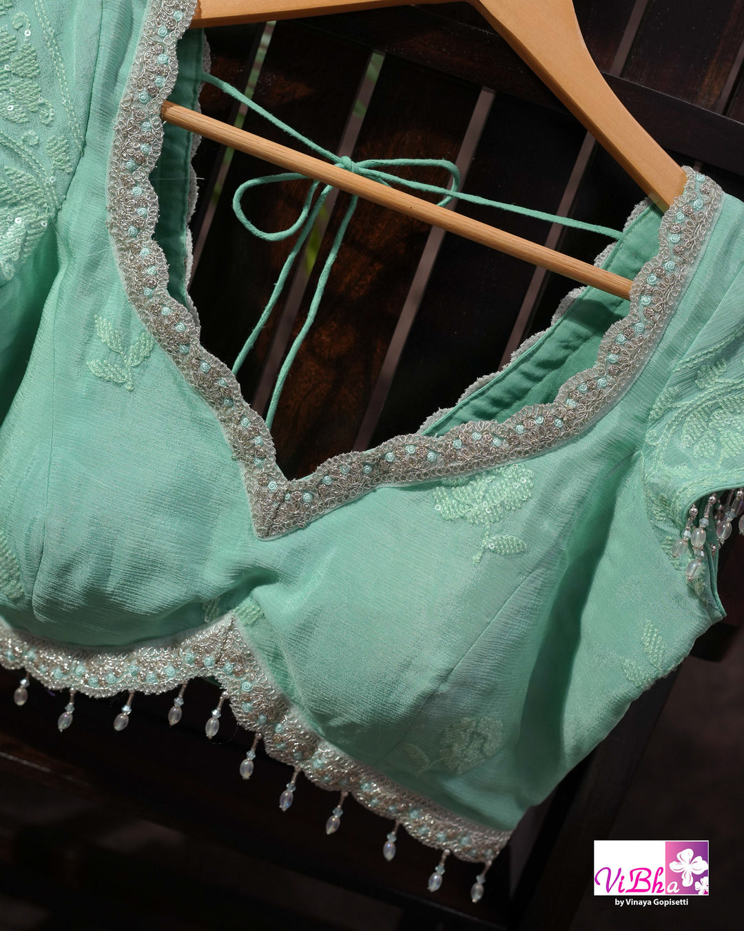 Mint Green Designer Saree with Tonal Floral Embroidery and Tassel Details