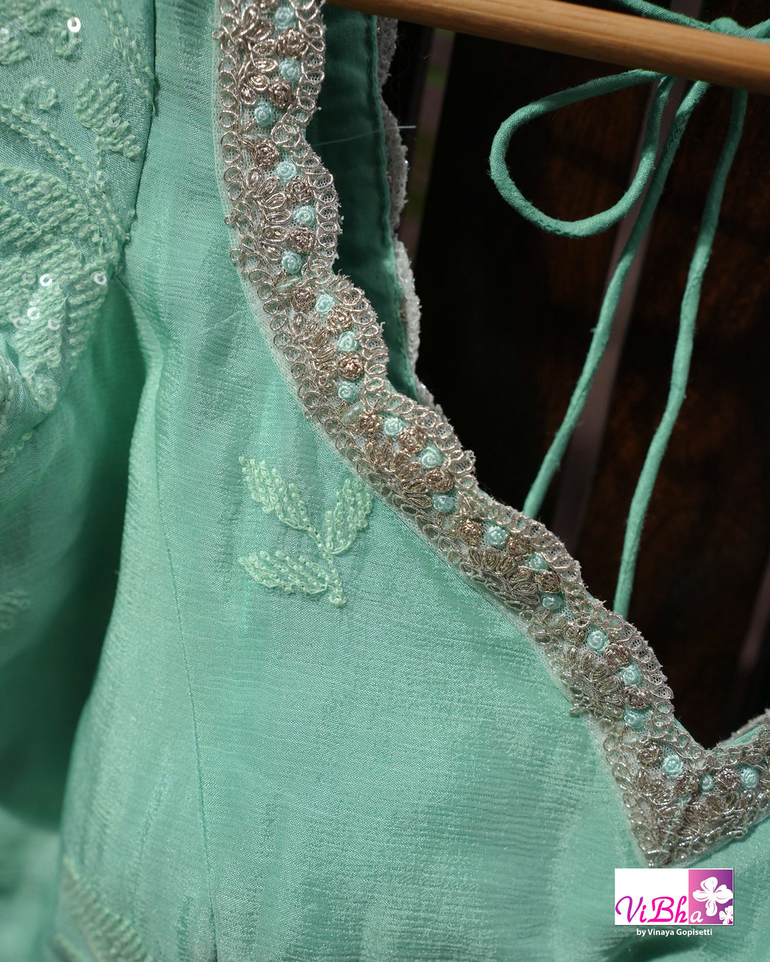 Mint Green Designer Saree with Tonal Floral Embroidery and Tassel Details