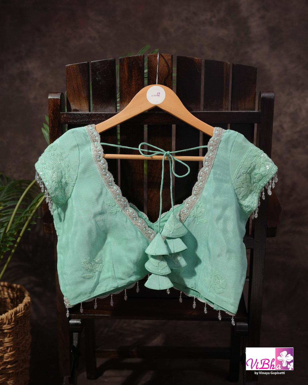 Mint Green Designer Saree with Tonal Floral Embroidery and Tassel Details