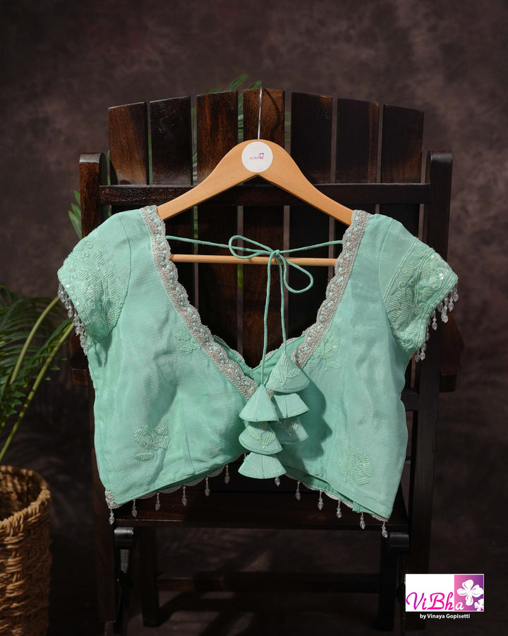 Mint Green Designer Saree with Tonal Floral Embroidery and Tassel Details