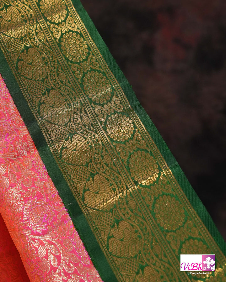 Coral Pink Kanchi Silk Saree with Floral Woven Design and Forest Green Gold Border