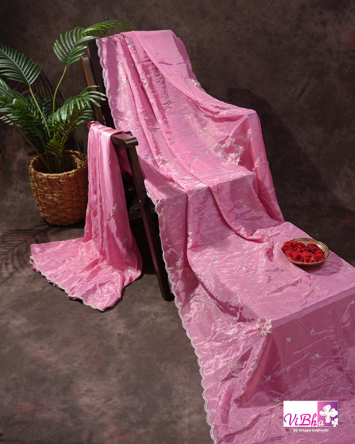 Pink Shimmer Designer Saree with Floral Detailing and Fuchsia Blouse Styling